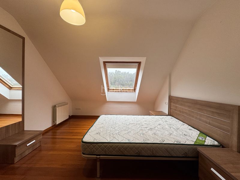 Foto a1f90560-f2c6-4abd-80d6-066063a7cacc. Rent flat with heating parking in O Milladoiro Ames