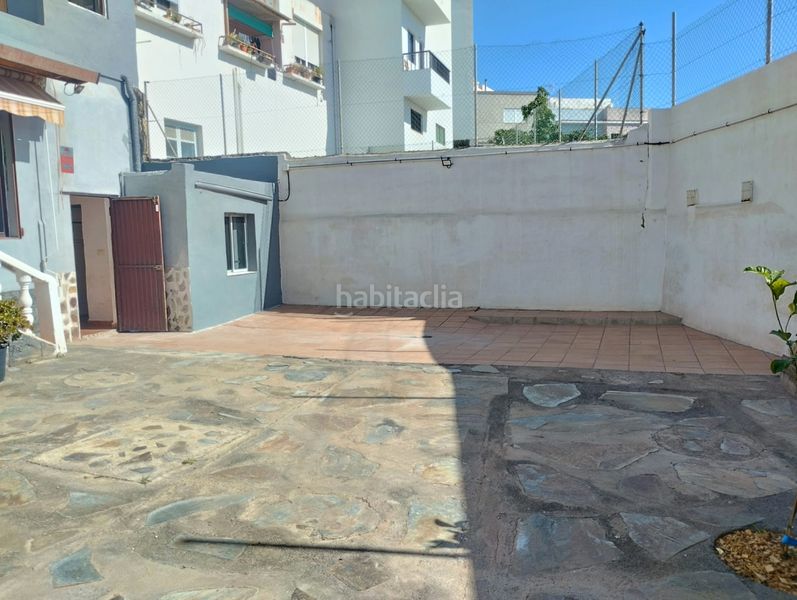 Foto 35e9d949-a4d5-49c6-96a3-fb15356f781e. Casa adossada amb aparcament a Centro Güímar