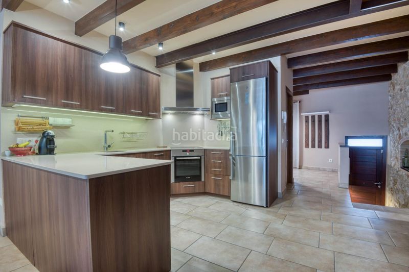 Foto ca2d16e9-5f48-4c2e-b31e-3abf187f43f8. Casa adossada a Eixample Sant Feliu de Guíxols