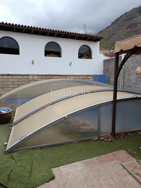 Foto e095c10f-a1f1-4792-894b-ce330aed06a2. Chalet with fireplace parking pool in Araya Candelaria