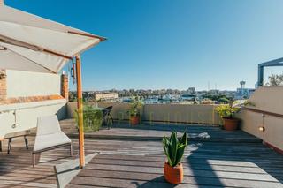 Attico  Paseo colón. Ático de ensueño con terraza privada y vistas al puerto en el co