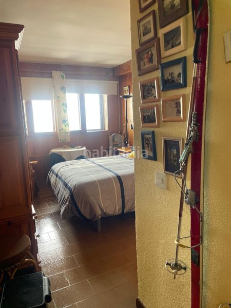 Foto 64b1628a-6d07-49a7-a84f-08224c61680d. Apartament amb xemeneia aparcament a Zona alta Sierra Nevada