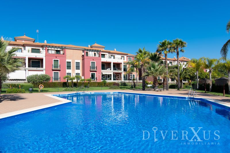 Foto f2515362-92a8-413b-8daf-78d3ae4a0d44. Apartament amb piscina a Isla Canela Ayamonte