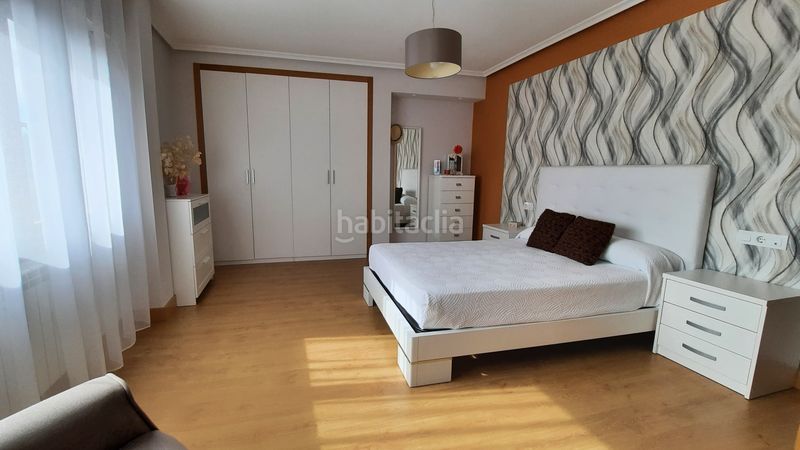 Foto b25a3802-c6b9-4fca-bdca-342e34d24bea. Casa adosada en Briones