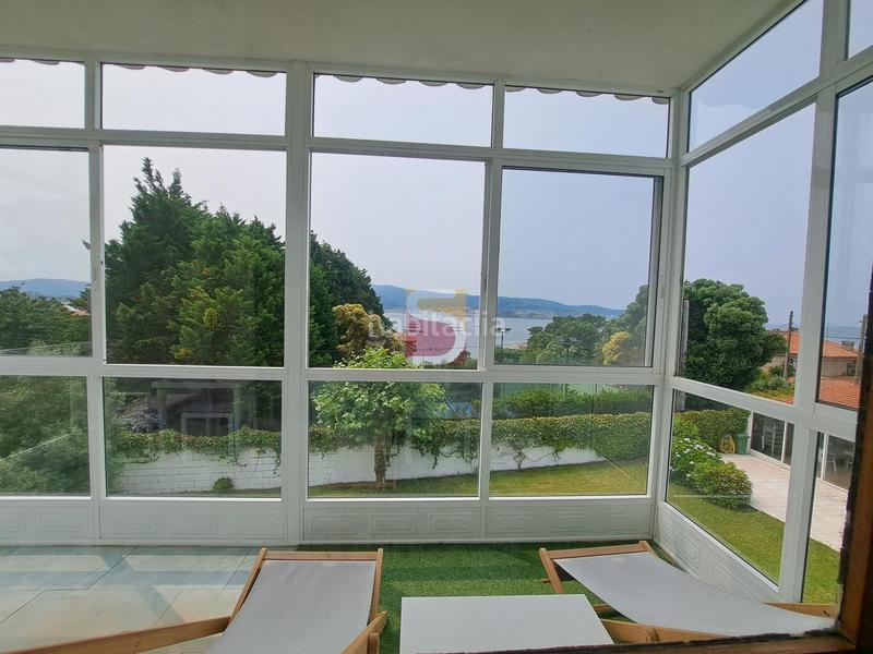 Foto 50194e97-716f-4b09-ba10-46f7c5df4134. Chalet mit heizung in Panxón Nigrán