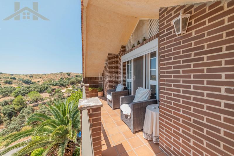 Foto 5a1d8ec8-ac85-46df-b1bf-06e55c37ce1f. Chalet with fireplace heating parking pool in Pino Alto-Navarredonda Valdemorillo