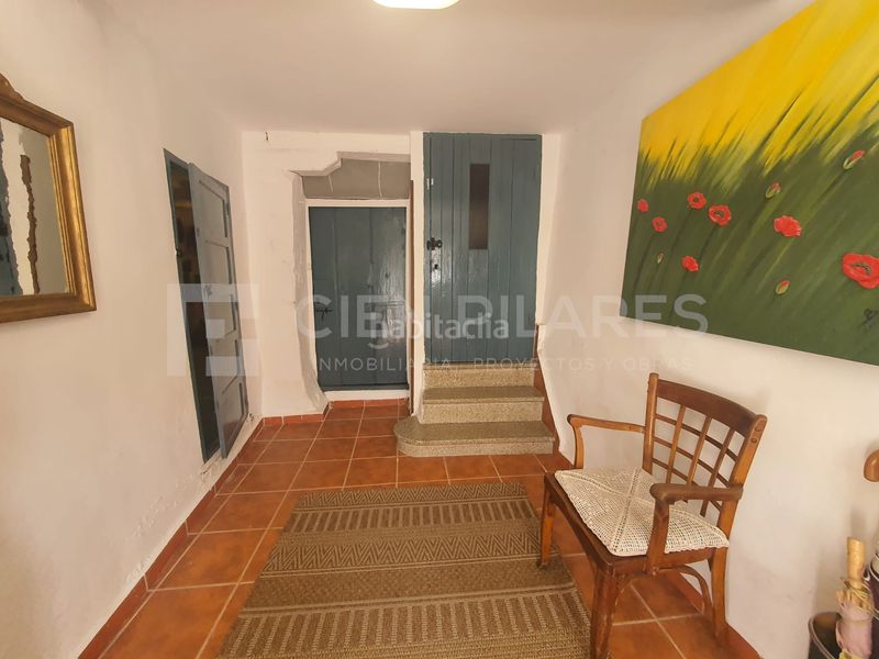 Foto d7d9a8fd-f951-466b-b81d-1f9f67290614. Casa adossada a Muro de Aguas