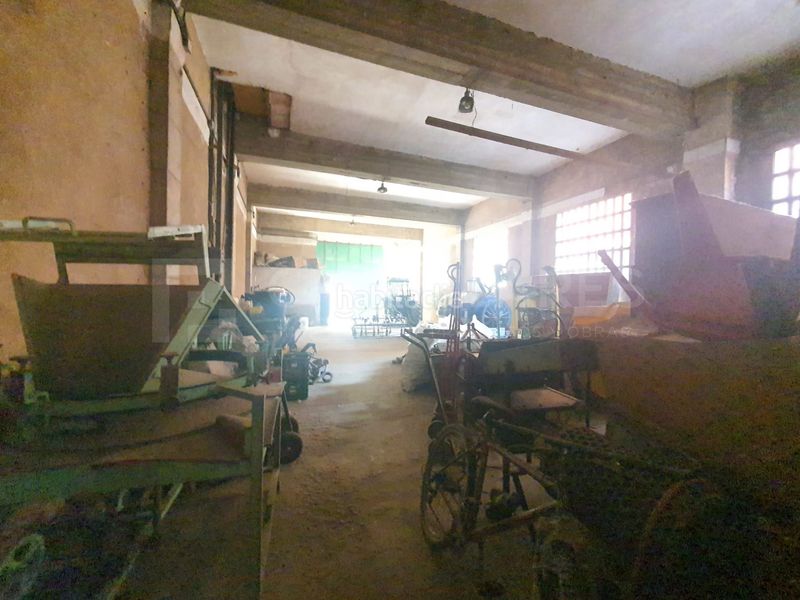 Foto a6f20de3-bea9-4293-bc9f-d934724a68c8. Bâtiment à usage industriel dans Quel