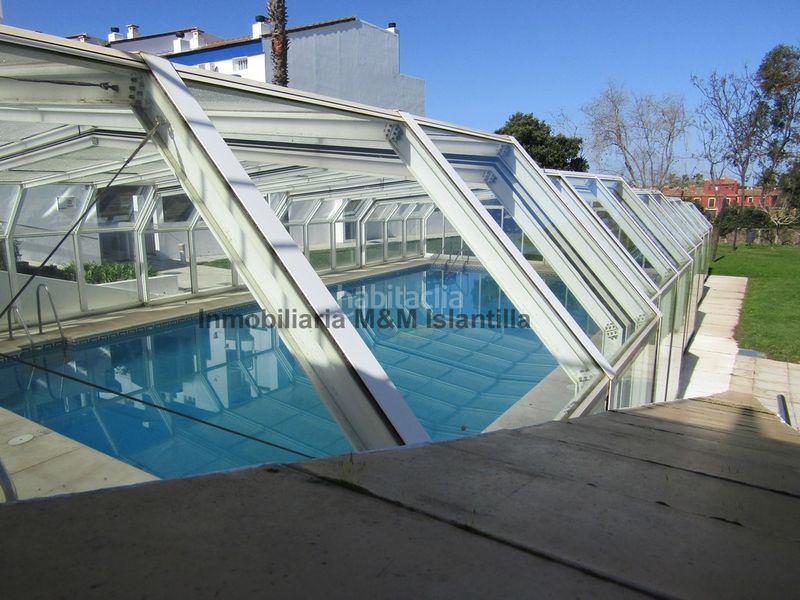 Foto 121846dc-255a-441b-9dc4-a796562ab6f6. Casa adossada amb aparcament piscina a Islantilla golf Islantilla