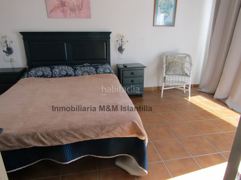 Foto a6fd2940-84ae-454c-8ecb-448c4f535118. Casa adossada amb aparcament piscina a Islantilla golf Islantilla