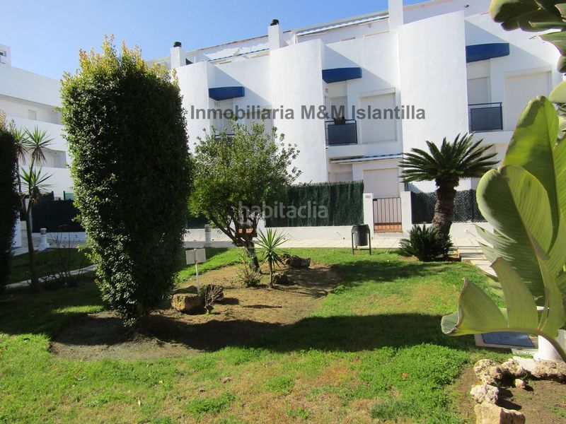 Foto a7417176-b013-4486-82b0-50cd3167fb82. Casa adossada amb aparcament piscina a Islantilla golf Islantilla