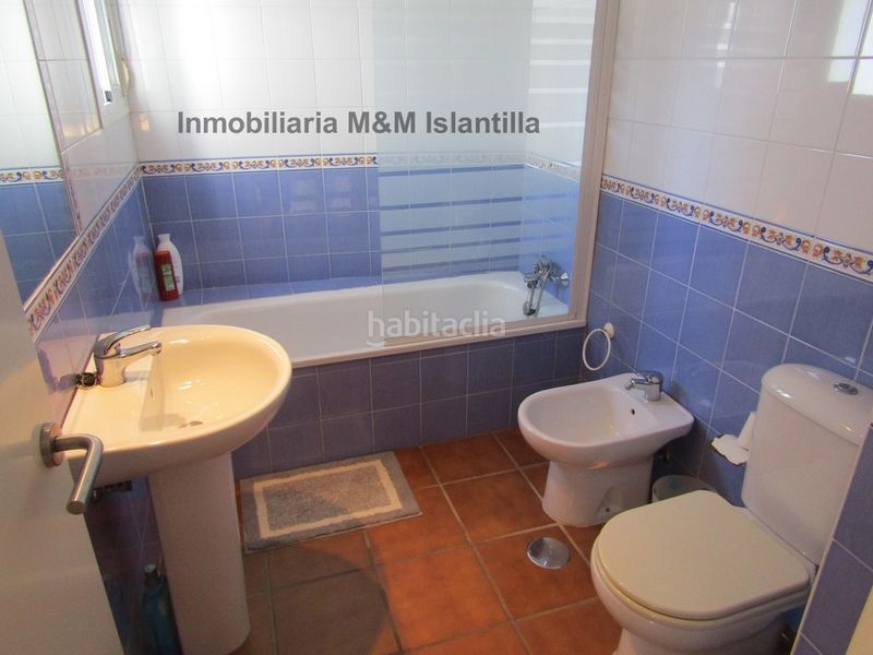 Foto b28d8d49-2d73-48d3-ba3a-f8f9519fa9a1. Casa adossada amb aparcament piscina a Islantilla golf Islantilla