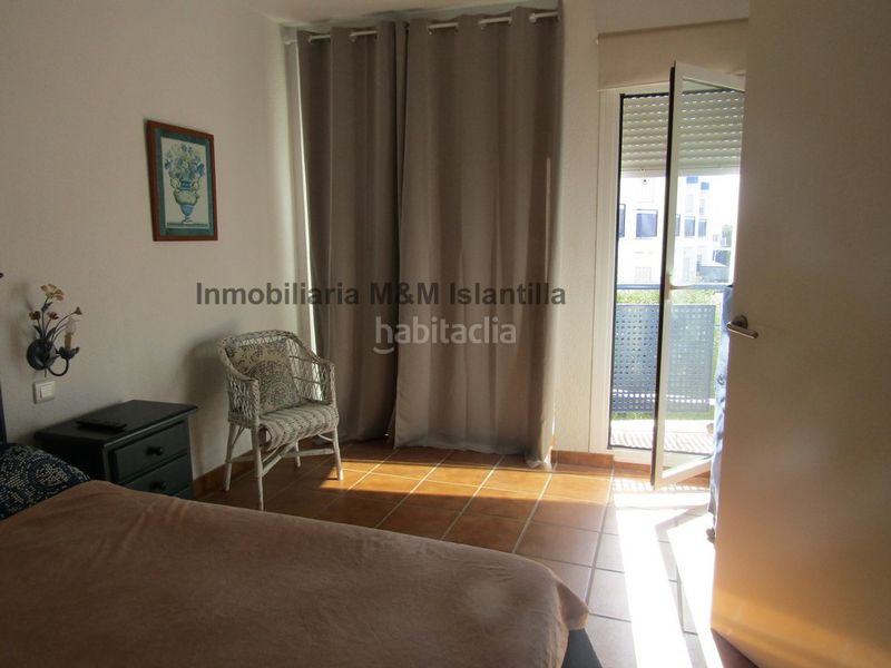 Foto b2988c2c-d23e-4fc9-aabd-b1c329748d89. Casa adossada amb aparcament piscina a Islantilla golf Islantilla