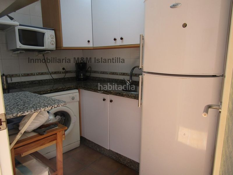 Foto b8969cc7-cbfa-4a68-9002-8ff94fb34479. Casa adossada amb aparcament piscina a Islantilla golf Islantilla