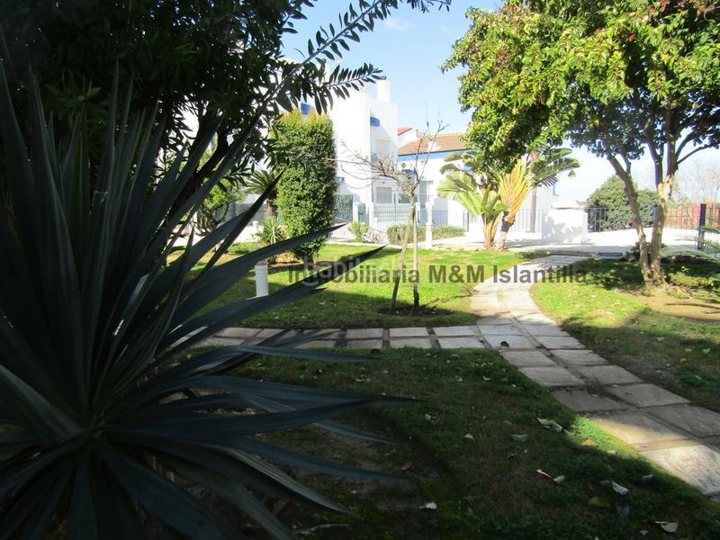 Foto c5e0872b-7293-4538-bc18-6b83bf3d8911. Casa adossada amb aparcament piscina a Islantilla golf Islantilla
