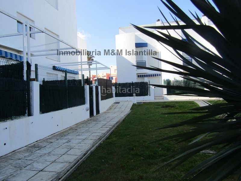 Foto e33f0b8a-7796-407d-b772-84e6e30aa5cb. Casa adossada amb aparcament piscina a Islantilla golf Islantilla