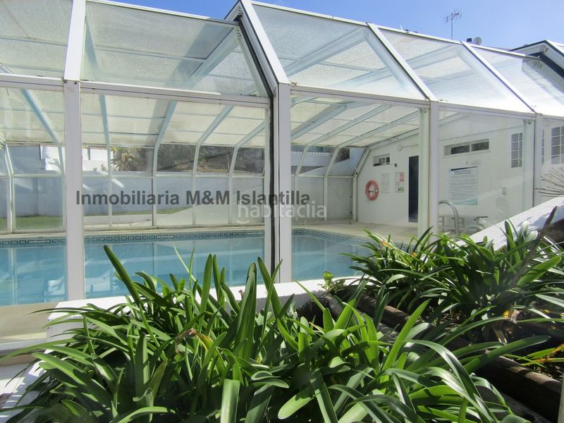 Foto e7d613c9-2399-42ba-871c-46083809e6fe. Casa adossada amb aparcament piscina a Islantilla golf Islantilla