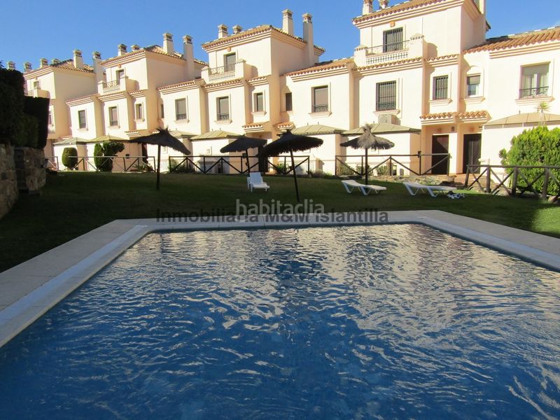 Foto 35bc97d7-5040-43d8-bc2b-ecdf05812560. Casa adossada amb piscina a Islantilla golf Islantilla