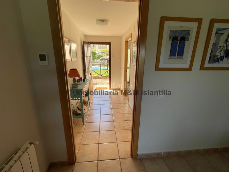 Foto 53a37382-0ef8-4964-b32e-0d730271a859. Casa adossada amb piscina a Islantilla golf Islantilla