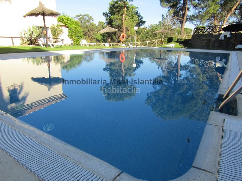 Foto afefd36d-57be-48ae-986e-c54b71353daf. Casa adossada amb piscina a Islantilla golf Islantilla