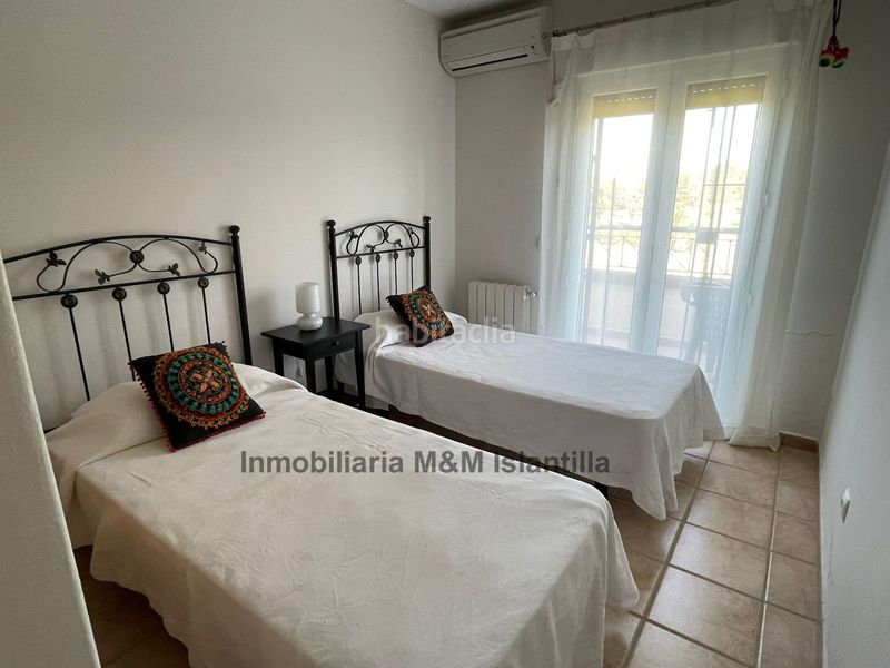 Foto b0aa6d82-f439-4a24-82c0-1b475163995e. Casa adossada amb piscina a Islantilla golf Islantilla