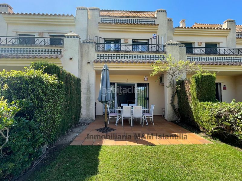 Foto b7cd5a7f-eb3e-4f17-b0f5-695233c65816. Casa adossada amb piscina a Islantilla golf Islantilla