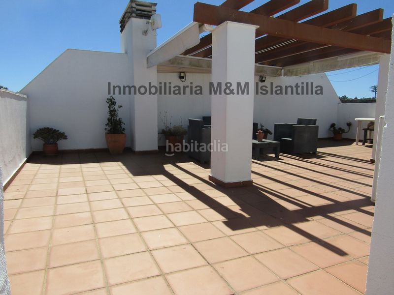 Foto 0faebb03-5b5b-42be-9116-703aeb159e7f. Àtic amb xemeneia aparcament piscina a Islantilla golf Islantilla