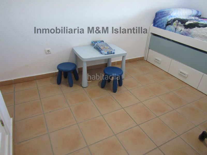 Foto 5ad16b9a-1138-4bf5-a06f-3a5760a4021f. Àtic amb xemeneia aparcament piscina a Islantilla golf Islantilla