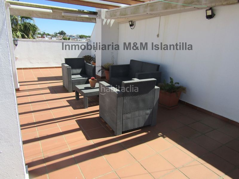 Foto d468ba51-f72e-44b0-896d-c3d25f8426d1. Àtic amb xemeneia aparcament piscina a Islantilla golf Islantilla