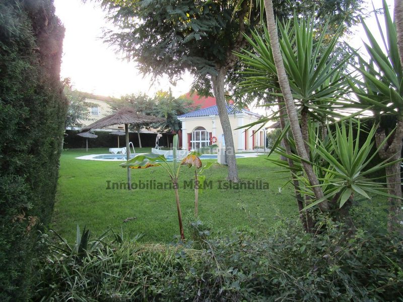 Foto b37c2d90-7b65-4ef3-b5f4-8fd246be5203. Casa adossada amb aparcament piscina a Islantilla golf Islantilla