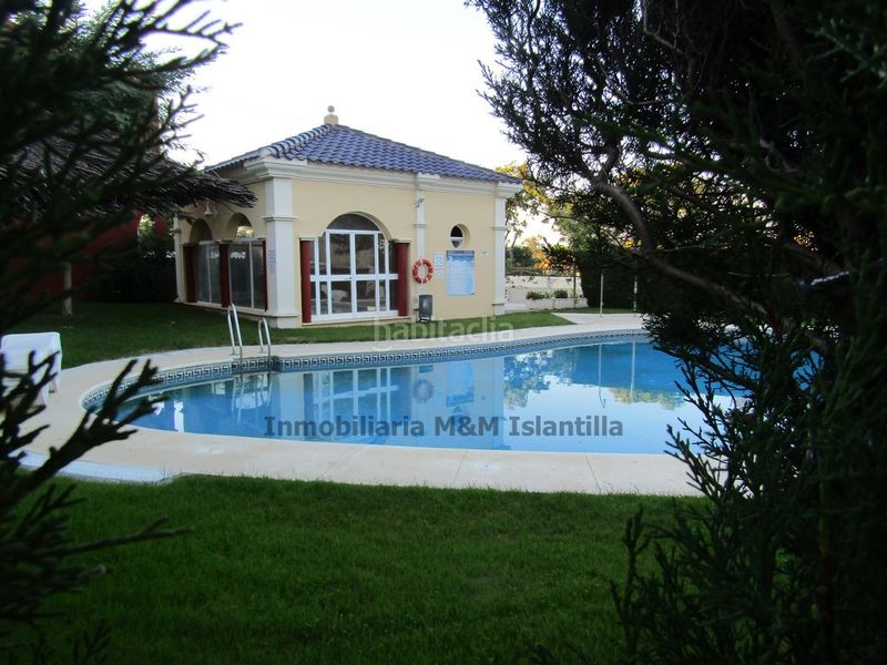 Foto f1480299-f119-4110-b477-43c77e4e42b2. Casa adossada amb aparcament piscina a Islantilla golf Islantilla
