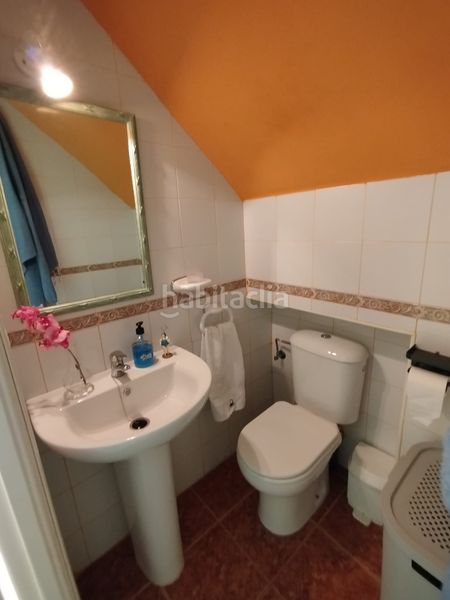 Foto fb9ea9d7-9394-4efc-b3ac-11f37180e0b4. Casa adossada amb aparcament piscina a Islantilla golf Islantilla