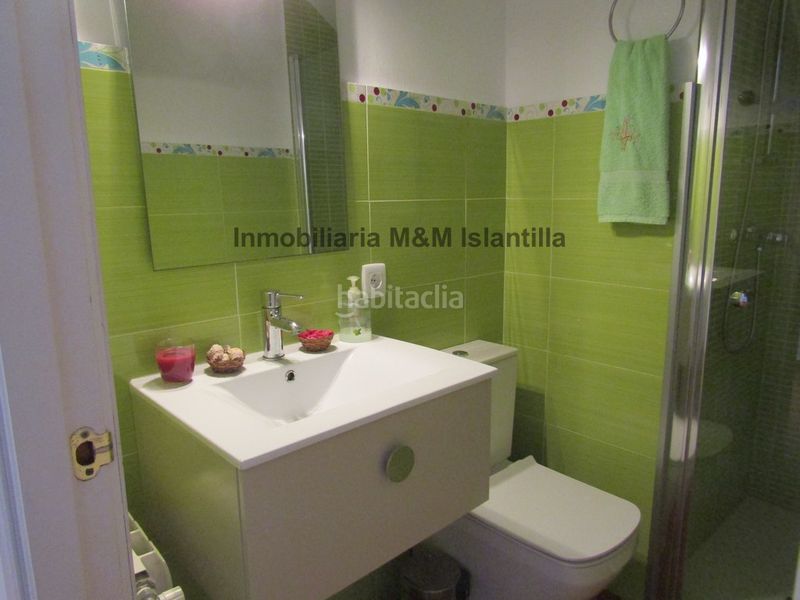 Foto 157c3bf1-98a1-48e0-b0eb-2dbe6dfa9444. Casa adossada amb aparcament piscina a Islantilla golf Islantilla