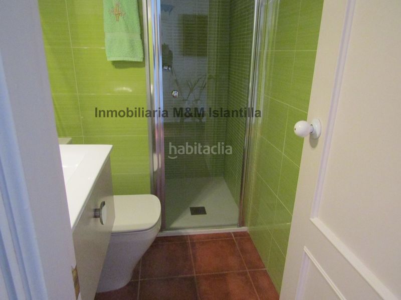 Foto 23f39d03-3442-42f7-b41d-908baa45ef4c. Casa adossada amb aparcament piscina a Islantilla golf Islantilla