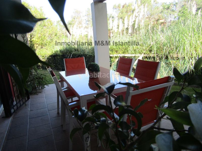 Foto b6f40037-c5b8-4270-a802-ad2e8baad485. Casa adossada amb aparcament piscina a Islantilla golf Islantilla