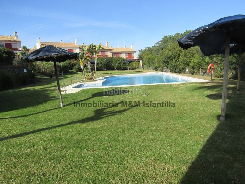 Foto f9f5c68c-03a6-4515-8218-83cefd9534d7. Casa adossada amb aparcament piscina a Islantilla golf Islantilla