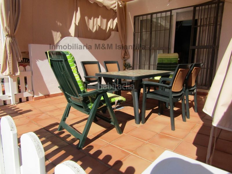 Foto 5336d714-0645-4084-b1af-a9a582e4270e. Casa adossada amb aparcament piscina a Islantilla golf Islantilla