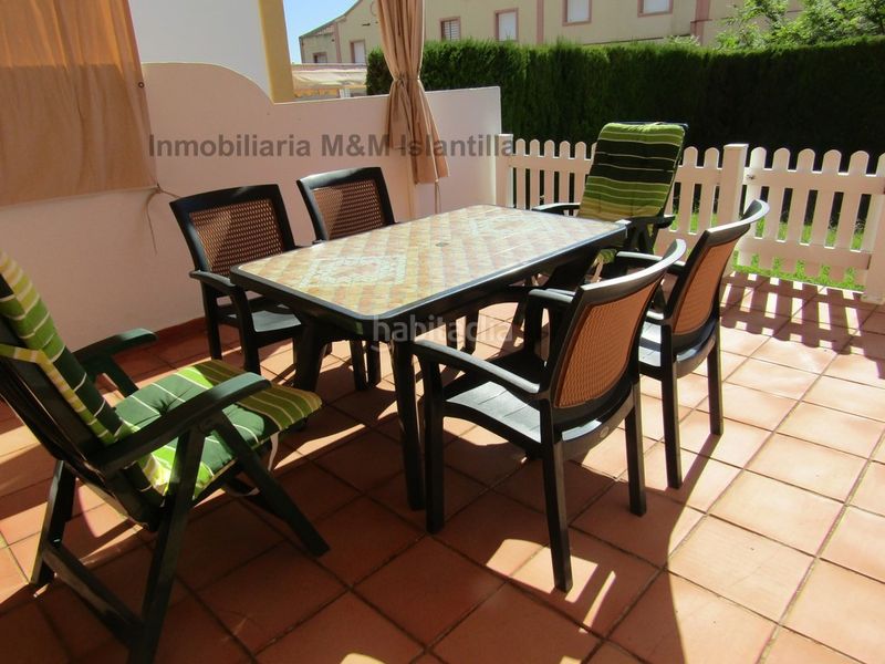 Foto 5628bf19-4551-472c-943d-fd71ec2c4b88. Casa adossada amb aparcament piscina a Islantilla golf Islantilla