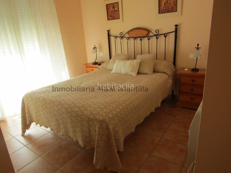 Foto aaf1b14f-2cba-4368-abea-9e10587230c7. Casa adossada amb aparcament piscina a Islantilla golf Islantilla
