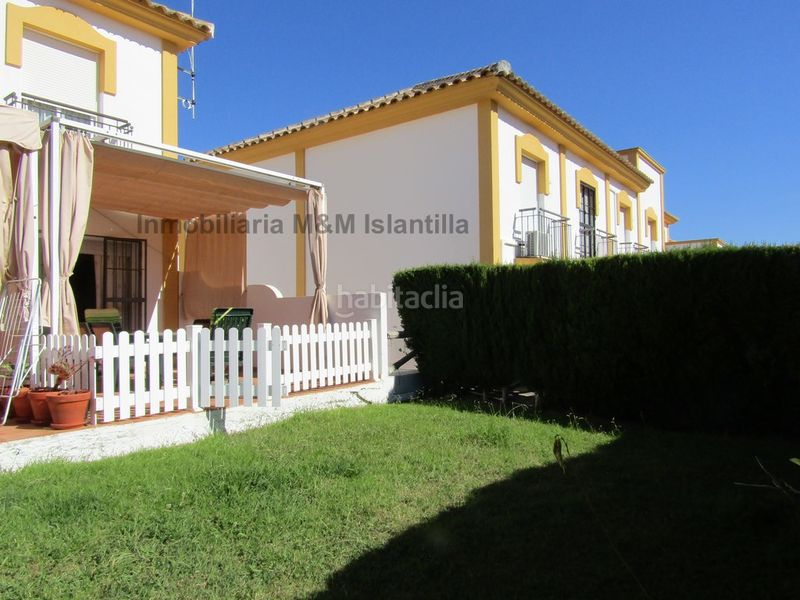 Foto c695870d-147b-490d-ae8d-e93a581f772a. Casa adossada amb aparcament piscina a Islantilla golf Islantilla