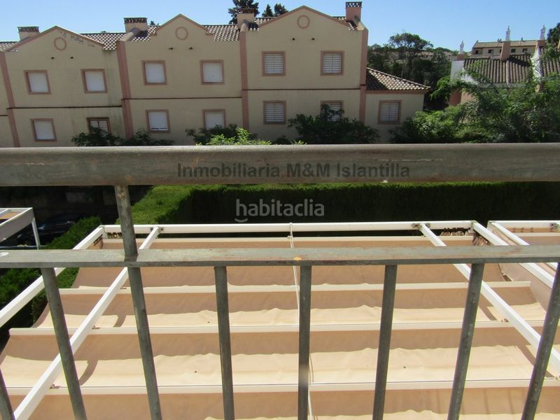 Foto cb6a127f-a109-4b1c-99dc-b89ed270e418. Casa adossada amb aparcament piscina a Islantilla golf Islantilla