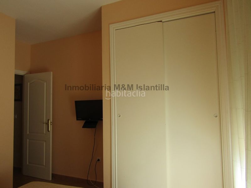 Foto f157c392-d36e-4bd5-90bf-eaeb36089847. Casa adossada amb aparcament piscina a Islantilla golf Islantilla