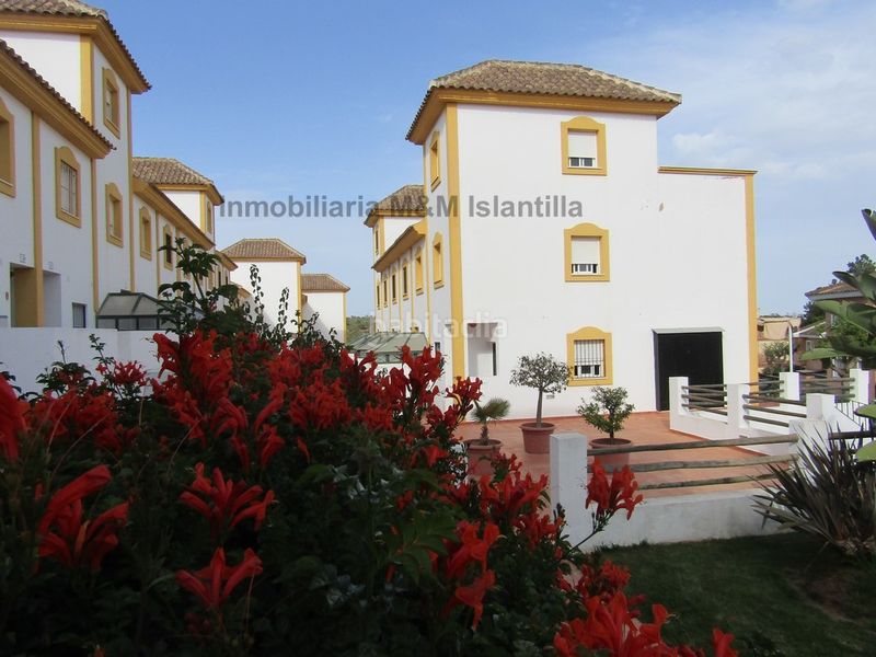 Foto f41901bd-ce13-46e1-af2a-fca31919770a. Casa adossada amb aparcament piscina a Islantilla golf Islantilla