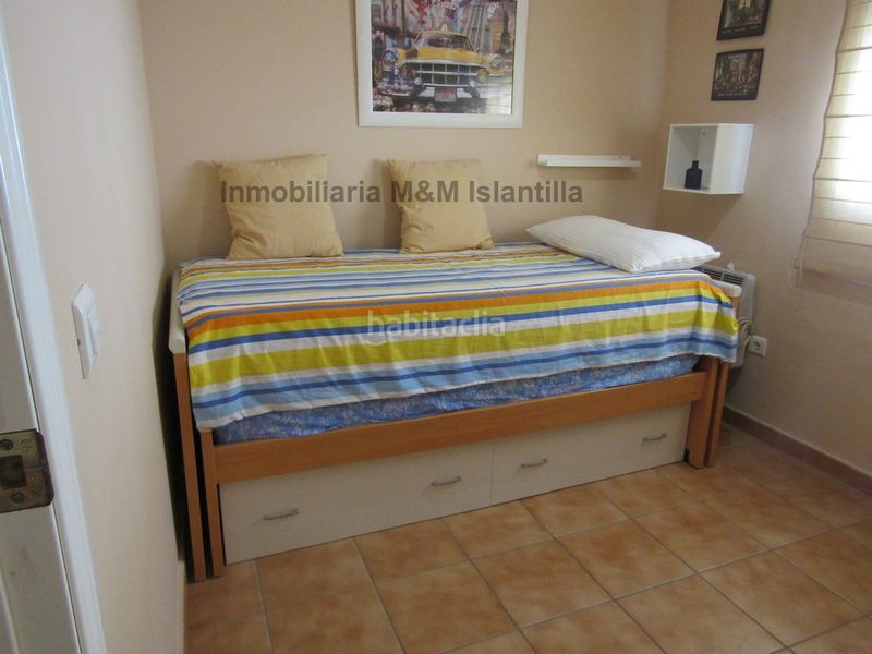 Foto fa20cf7d-8411-462b-87ac-5b0fc25705c3. Casa adossada amb aparcament piscina a Islantilla golf Islantilla