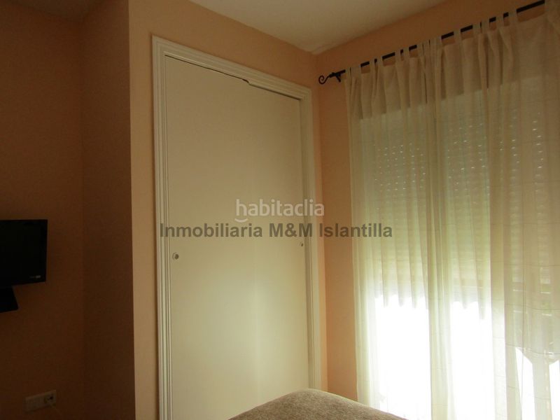 Foto fdd4d8da-6268-4ca7-b05b-dc8e0151a7a6. Casa adossada amb aparcament piscina a Islantilla golf Islantilla