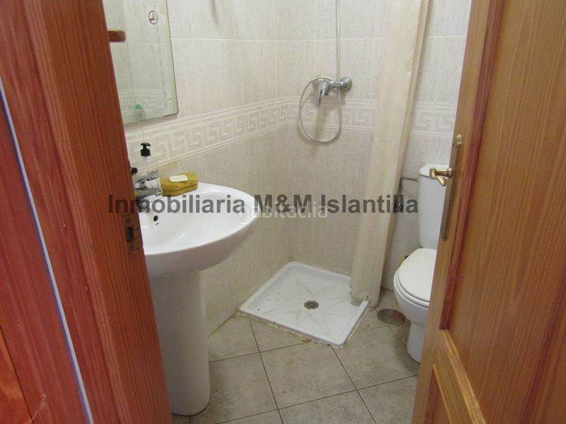 Foto 3681c75b-0d2e-409e-8b88-f4a76c3a893c. Casa adossada amb aparcament piscina a Islantilla golf Islantilla