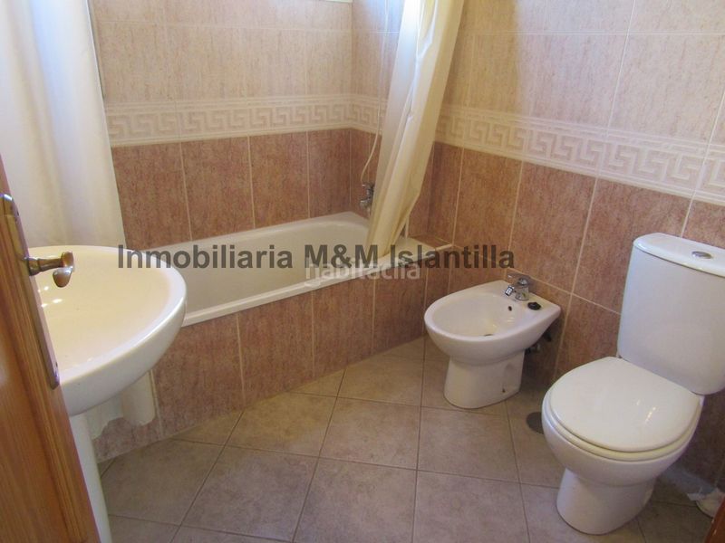 Foto bb6d1aff-67d7-4d46-bfcd-7fa0308638e2. Casa adossada amb aparcament piscina a Islantilla golf Islantilla