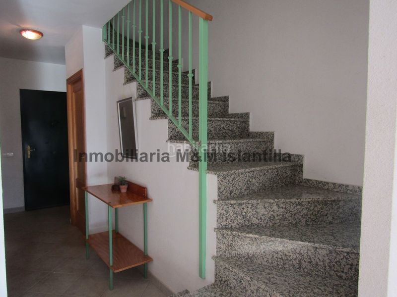 Foto ca152e4b-b2f4-40be-87e3-d799fbd609ae. Casa adossada amb aparcament piscina a Islantilla golf Islantilla