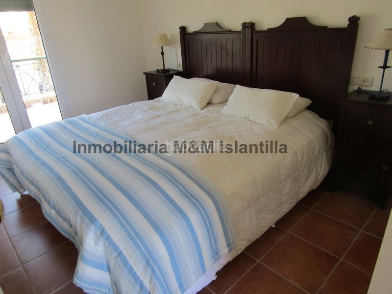 Foto 04d1e18d-981c-4dd2-8114-d2757620b64b. Casa adossada amb aparcament piscina a Islantilla golf Islantilla