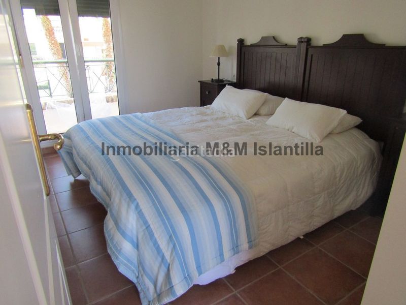Foto 12974b52-ade7-4c34-9063-64b2232cc87b. Casa adossada amb aparcament piscina a Islantilla golf Islantilla